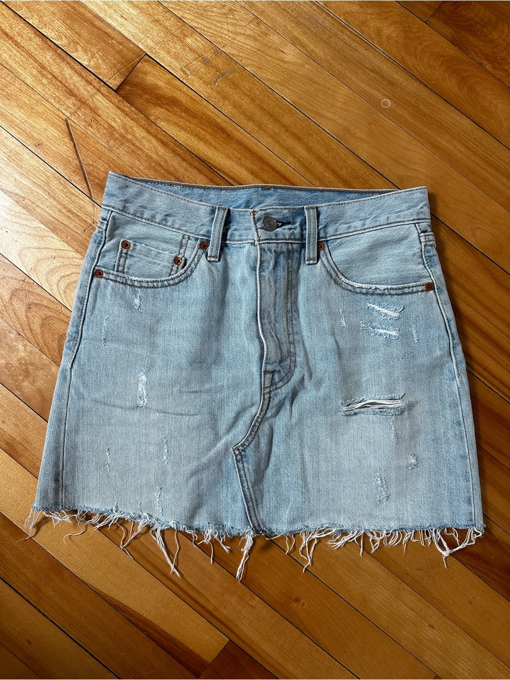 Levi’s Light Wash Distressed Denim Mini Skirt